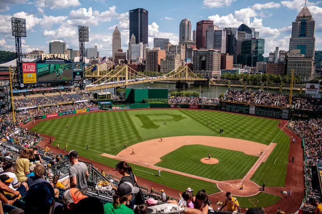 which-side-does-the-home-team-sit-on-in-baseball-stick-bat